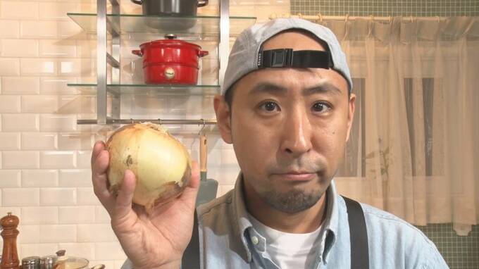野菜を持つ男性