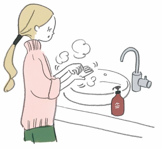 手を洗う人