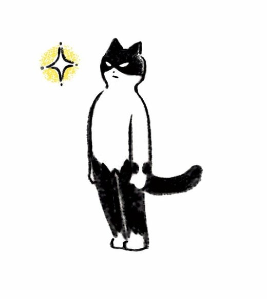 背筋を伸ばして立つ猫