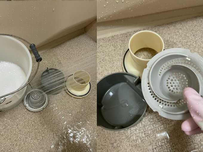 シャワーで排水口小物を洗う