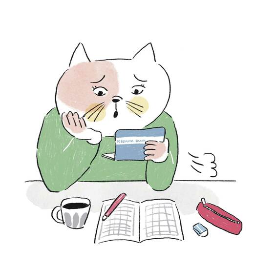 通帳を見てため息をつく猫