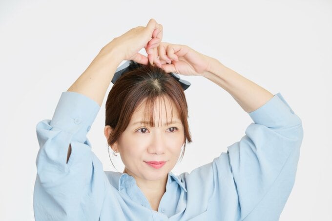 トップの髪を引き上げる