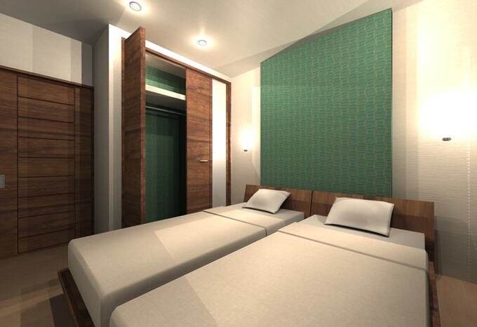 ベッドの横にはフロアスタンドの代わりに壁付けの照明を設置