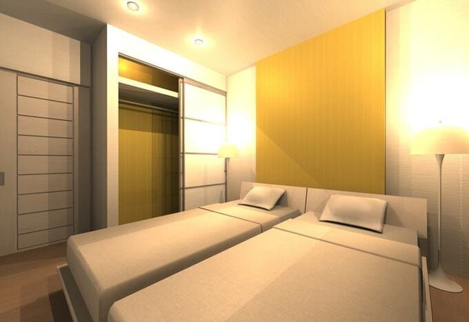 アクセントクロスと、クロゼット内のクロスを黄色にすることで、明るい寝室に