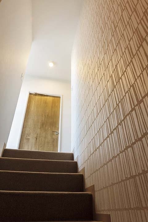 アクセントクロスをあしらった階段室