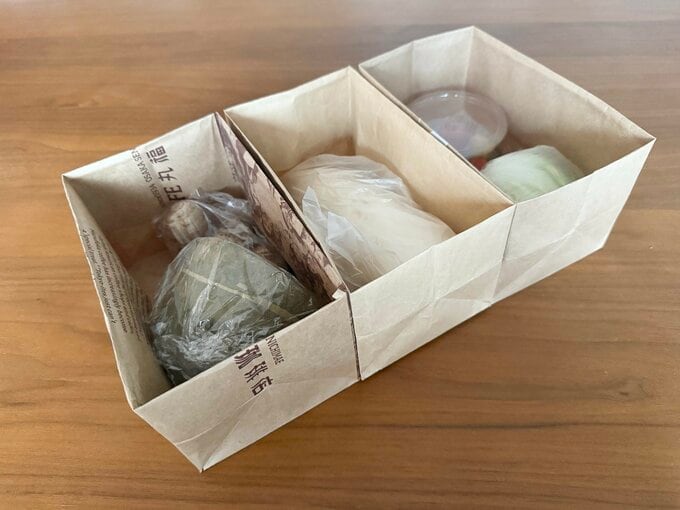 紙袋で野菜室収納