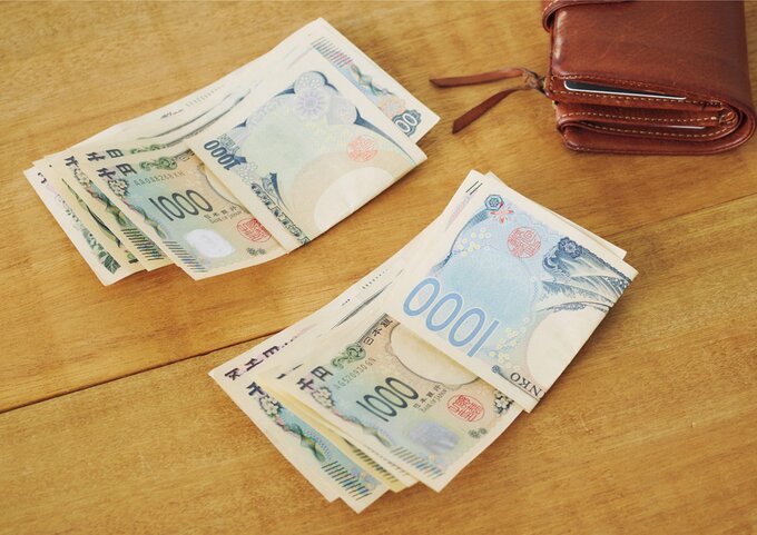 1万円分ずつまとめられた千円札