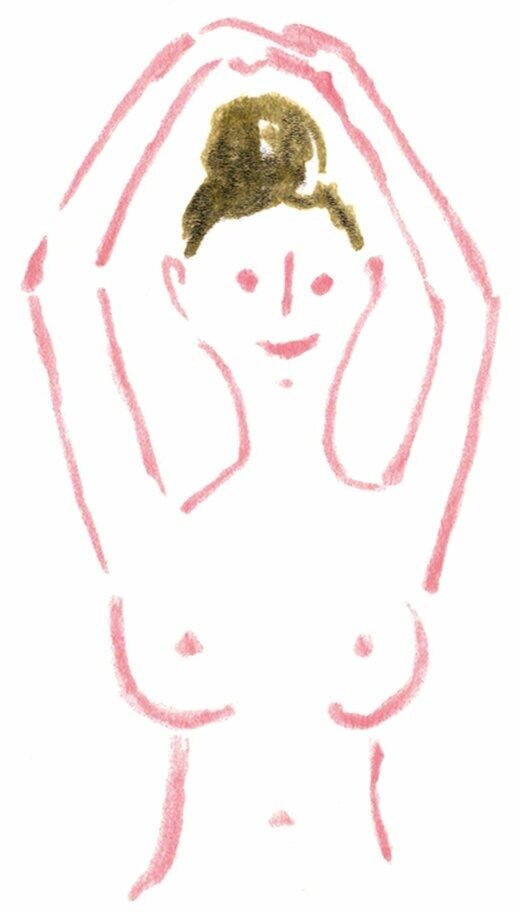 腕を上げて乳がんチェックをする女性