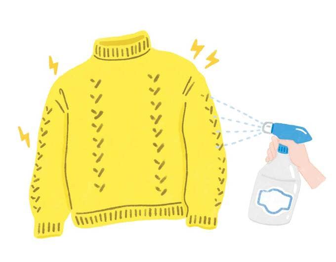 スプレーをニット全体に吹きかける