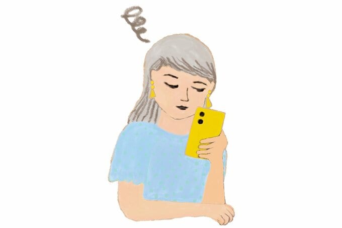 スマホを見る女性のイラスト