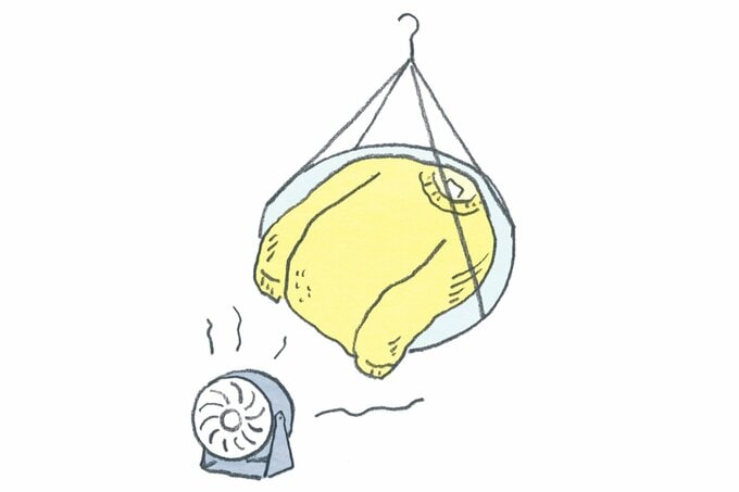 ニットを干す様子のイラスト