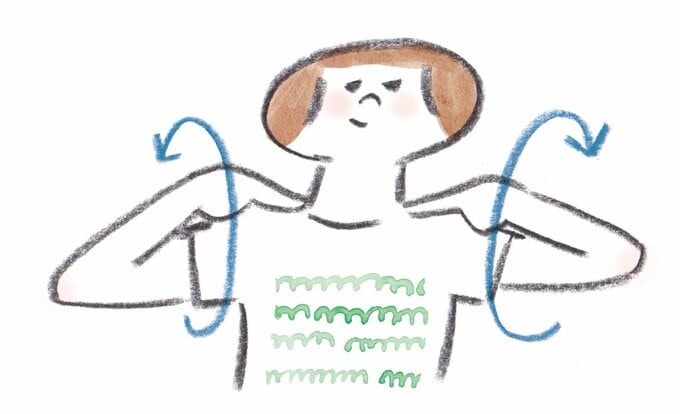 肩回しをする女性