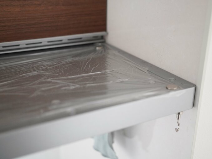 換気扇の上をラップでカバー