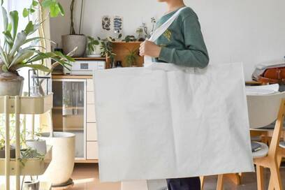 無印良品の150円エコバッグ。返金可能で、布団の収納にも便利