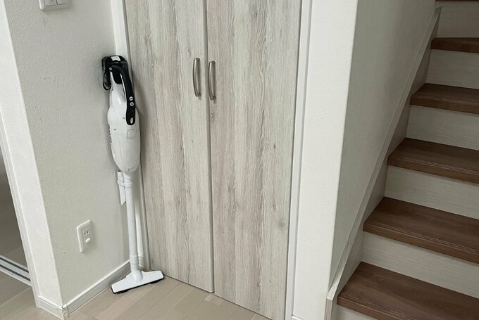 部屋の隅の掃除機