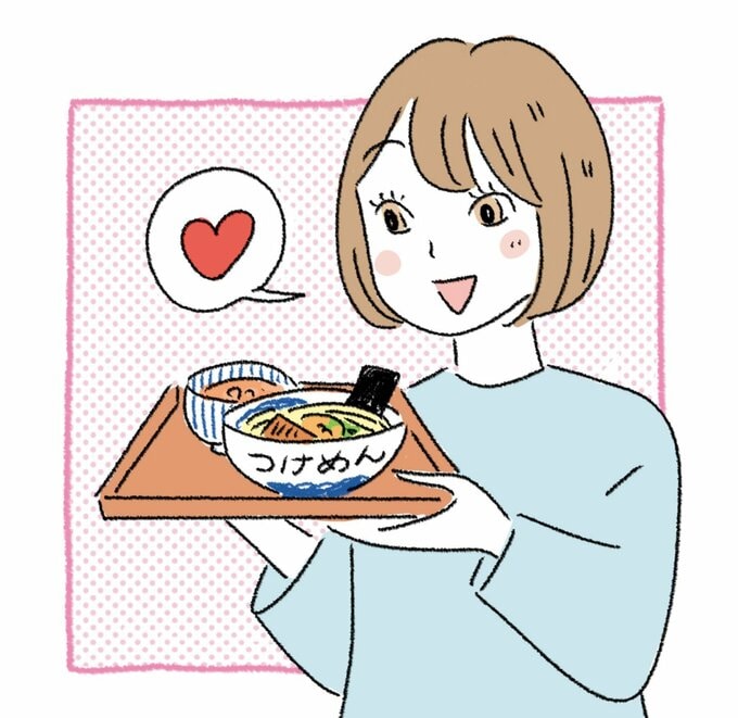 つけ麺を見る女性