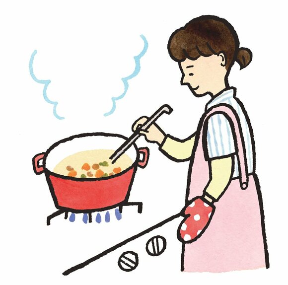 料理をしている女性