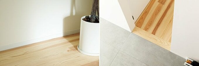 廊下と玄関との床の継ぎ目に用いられる横木や壁と床の継ぎ目に設置される幅木、建具周りなどのディテールはシンプル仕上げ2