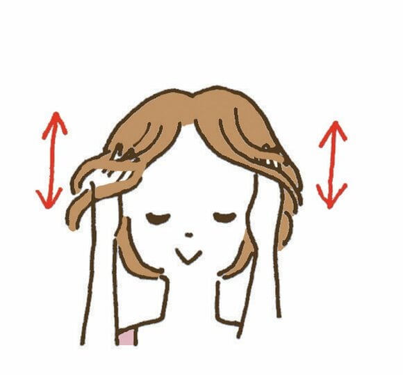 地肌をほぐすように指を上下に動かす