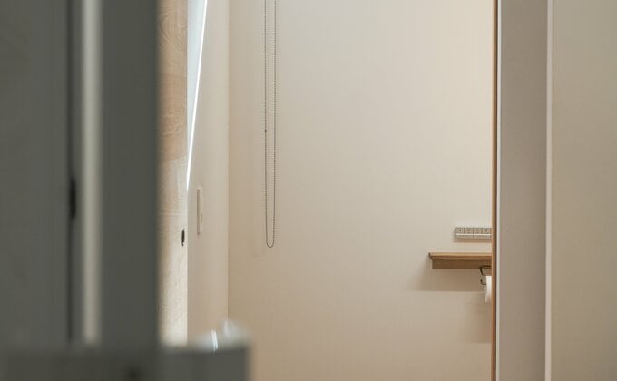 浴室からトイレまで一直線になる間取りを採用